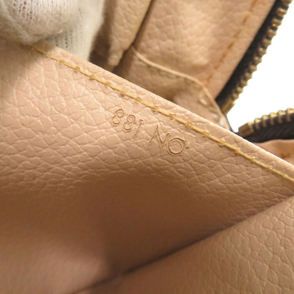 LOUIS VUITTON Brown Monogram Pouch - Picture 10 of 10